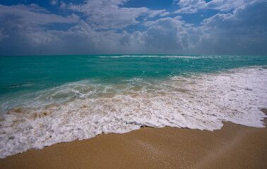 Sea wave. Blue ocean waves. Foamy wave. Rolling sea beach waves. Gentle sea beach wave. Summer sea beach.