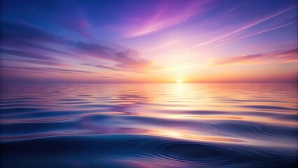 Obraz premium Serene Sunset Hues Reflected on a Calm Ocean Surface, Painting a Captivating Scene of Tranquility