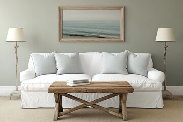Living room featuring a white sofa wooden table and artwork