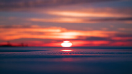 Winter sunset over snow-covered landscape