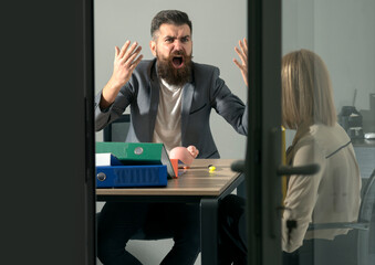 Angry boss shouting at an employee. Office conflict. Frustrated secretary dealing with a rude boss....