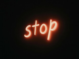 the word "stop" written in cursive font, white text, black background, minimal design