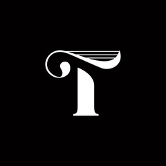 Decorative letter T with music instrument theme, hidden harp on top of bar