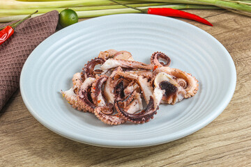 Grilled octopus tentacle sliced appetizer