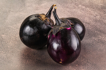 Raw violet and black eggplant