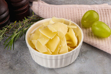 Parmesan cheese slices in the bowl
