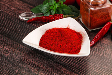 Spicy dry paprika powder in the bowl
