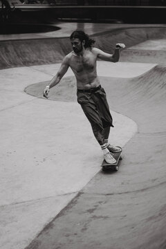 Young men skateboarding in skate park, Canggu, Bali, Indonesia