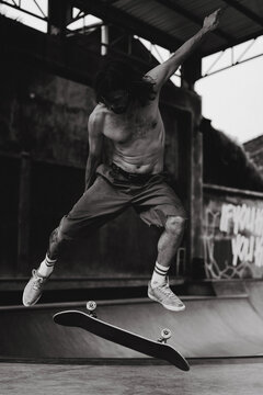 Young men skateboarding in skate park, Canggu, Bali, Indonesia
