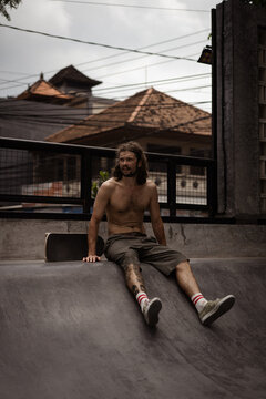 Young men skateboarding in skate park, Canggu, Bali, Indonesia