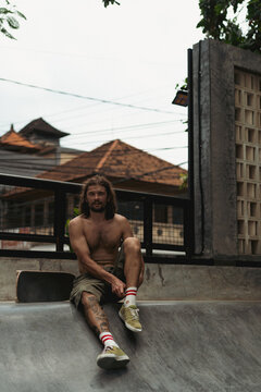 Young men skateboarding in skate park, Canggu, Bali, Indonesia