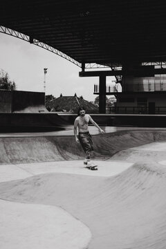 Young men skateboarding in skate park, Canggu, Bali, Indonesia