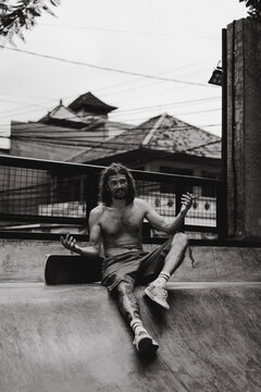 Young men skateboarding in skate park, Canggu, Bali, Indonesia