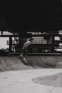 Young men skateboarding in skate park, Canggu, Bali, Indonesia