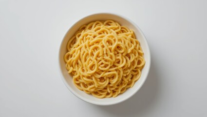 Close Up View of Plain Spaghetti Noodles in a White Bowl on a Minimalist Background