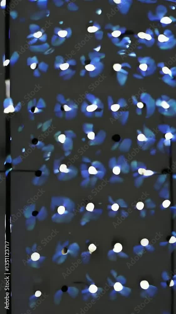 Poster kaleidoscopic light patterns shifting across led panels in dynamic sequence
