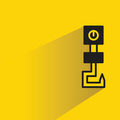 pulley crane hook icon on shadow yellow background