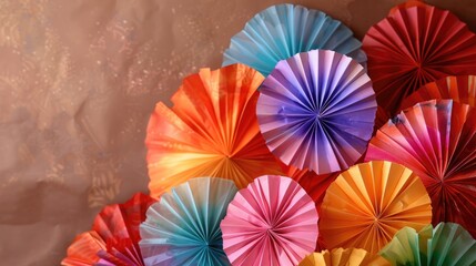 Colorful Paper Fans Arranged on a Brown Background