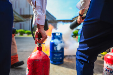 Company employees are undergoing basic fire extinguishing training, fire extinguisher use, safety week, fire prevention, loss prevention,