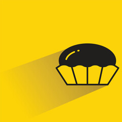 cupcake icon with shadow on yellow background