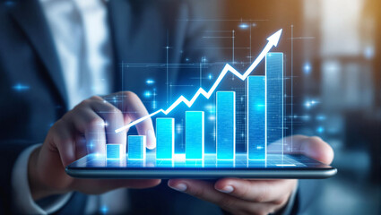 Businessmen use tablets to analyze graphs of digital transformation and business growth