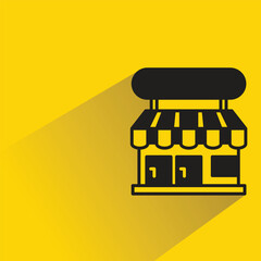 shop icon with drop shadow on yellow background