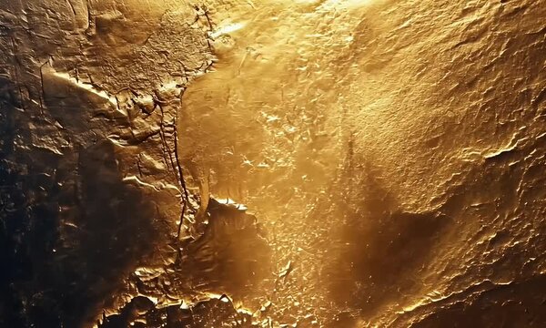 Textured golden surface with deep creases
