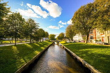 View of the canal and surrounding area in Friedrichstadt, a climatic health resort in North Frisia.
