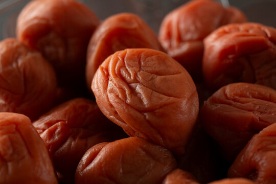 A closeup view of a pile of umeboshi.