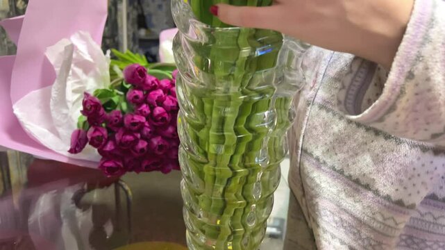 unpacking a huge bouquet of tulips