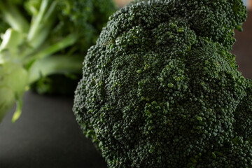 A closeup view of a head of broccoli.