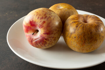 A view of a plate of dinosaur plums.