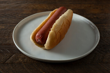 A view of a hot dog on a plate.