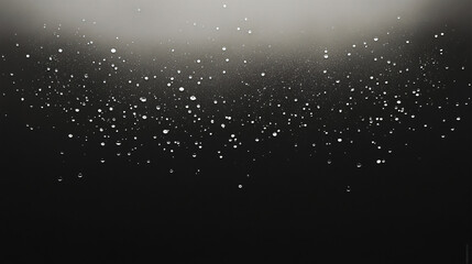 Elegant black and white background featuring water droplets frozen mid-air captured in a dynamic and artistic composition.