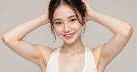 Naklejka premium A professional close-up campaign image of an Asian woman with flawless skin, softly lifting her arms to reveal the clean and fresh appearance of her underarms