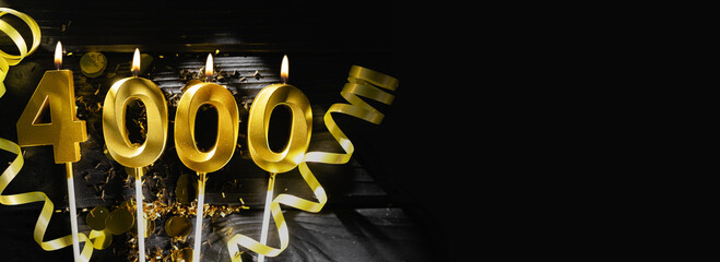 Golden candle number 4000 as number of followers or likes in social media. Festive black background. Banner.