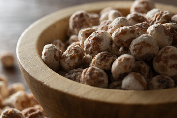 A closeup view of a bowl of tiger nuts.