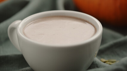 hot chocolate drink in white cup closeup