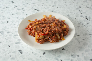 A view of a plate of corned beef.