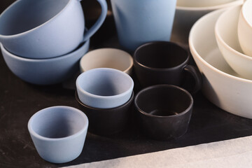 Matt ceramic handmade tableware in a workshop closeup