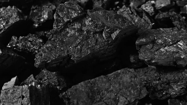 Natural black wood charcoal texture background	