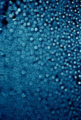Bokeh azul en fondo negro