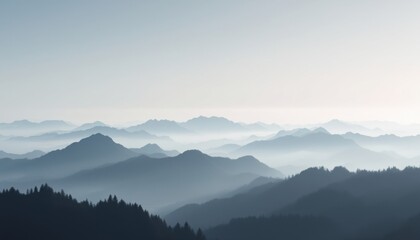 Fototapeta premium Tranquil mountain landscape with rolling fog and blue hues