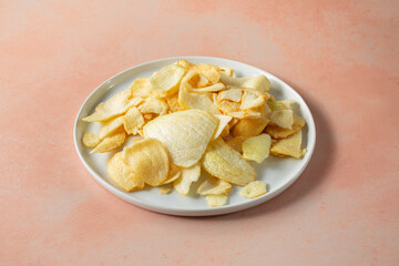 A view of a plate of onion chips.