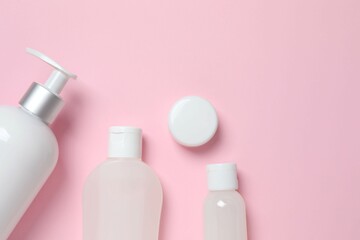 Natural cosmetic products a pink background, top view