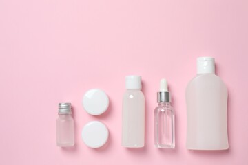 Natural cosmetic products a pink background, top view