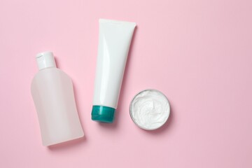 Natural cosmetic products a pink background, top view