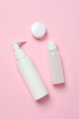 Natural cosmetic products a pink background, top view