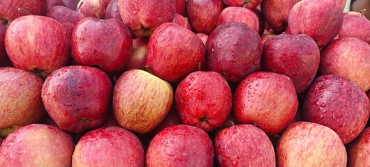 A pile of fresh red apples open sell in Indian market.
