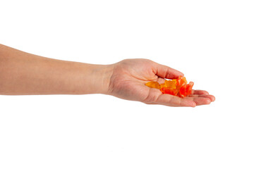 Assorted gummy candies, Juicy colorful jelly sweets. Gummy candies in hand on transparent background